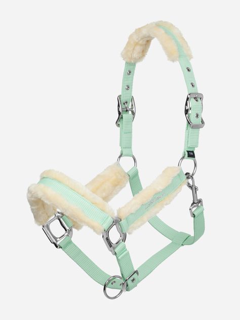 Pamper your pony just like Harlow's ponies, with this soft faux fur-lined halter in Harlow's favourite Softmint green. Luxurious lining on the headpiece, cheekpieces and noseband makes this an extra-special purchase. Perfect for catching, leading, and tying up, practising those tricky quick-release knots will be easy with the matching soft and flexible lead rope. This halter is fully adjustable with buckles on both sides and a trigger clip at the throatlash. Matching Harlow Collection horse and rider wear to create the perfect look are available. Halters For Horses, Equestrian Wishlist, Quick Release Knot, Pony Tack, Tack Store, Ice Blue Color, Rope Halter, Mulberry Color, Mink Colour