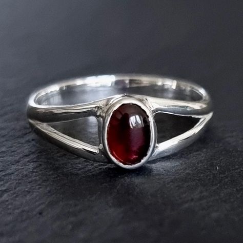 💖  Product Description Dainty Garnet Ring - Oval 925 Sterling Silver Garnet Ring Garnet is the January Birthstone and 2nd Anniversary Gemstone 💖 Product Details *  925 Sterling Silver *  Handmade *  Total Ring Length - 8mm *  Stone Size - 7mm x 5mm *. Stone Height - 3mm *  Weight - 2.8g *  Band Width - 3mm 💖 Ring Sizing If you're unsure of your finger size, please purchase the reusable plastic ring sizers we have available and follow the instructions in the FAQ section to determine your finge Garnet Sterling Silver Ring, 2nd Anniversary Gift, Garnet Ring Silver, Sterling Silver Garnet Ring, Boho Jewellery, Everyday Ring, 2nd Anniversary, Dope Jewelry, Garnet Jewelry