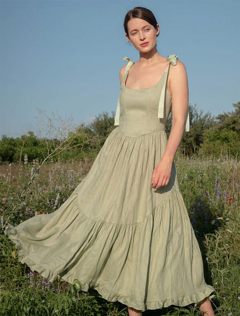 A truly special dress.  With rich ribbon tie straps, a corset bodice, and sweeping ruffle hem the Mirabelle Dress is dramatic, romantic beauty at its best and one of our most popular styles.  Made in a lightweight linen with a sateen finish that gives the linen a subtle dressy luster. A showstopper of a dress made for special moments, celebrations, or romantic getaways. One Of A Kind Dress, Aesthetic Dress Outfit Classy, Linen Bridesmaids Dresses, Linen Dress Ideas, Wedding Outfits For Guest, Linen Bridesmaid Dress, Granny Clothes, Aesthetic Dress Outfit, Rustic Dress