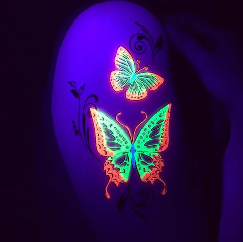 Glow Butterflies in the dark Neon Tattoo #tattoo #tattoos #smalltattoos #amazingtattoo #beautifultattoos #watercolorTattoo #InspirationalTattoos #ArtTattoo #NeonTattoo Uv Butterfly Tattoo, Glow In The Dark Tattoo Ideas, Uv Body Painting, Glow In The Dark Tattoo, Neon Tattoos, Glowing Tattoos, Uv Tattoos, Black Light Tattoo, Glow Tattoo