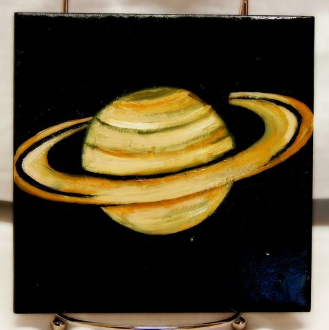 Saturn Original, acrylic Painting on 6" x 6" ceramic tile. Protective finish to give it an illustrious finish. To be displayed on an easel. Drawing Planets Space Easy, Moon And Saturn Painting, Saturn Painting Easy, Saturn Painting Acrylic, Saturn Drawing Simple, Planet Painting Easy, Saturn Painting, Saturn Drawing, Acyrlic Painting