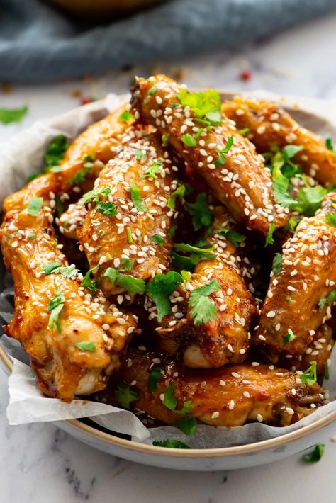 Honey Glazed Chicken Wings sprinkled with sesame seeds and fresh cilantro Honey Glazed Chicken Wings, Honey Wings Recipe, Honey Chicken Wings Recipe, Chinese Honey Chicken, Honey Baked Chicken, Honey Chicken Wings, Glazed Chicken Wings, Braised Chicken Breast, Chicken Wing Recipes Baked