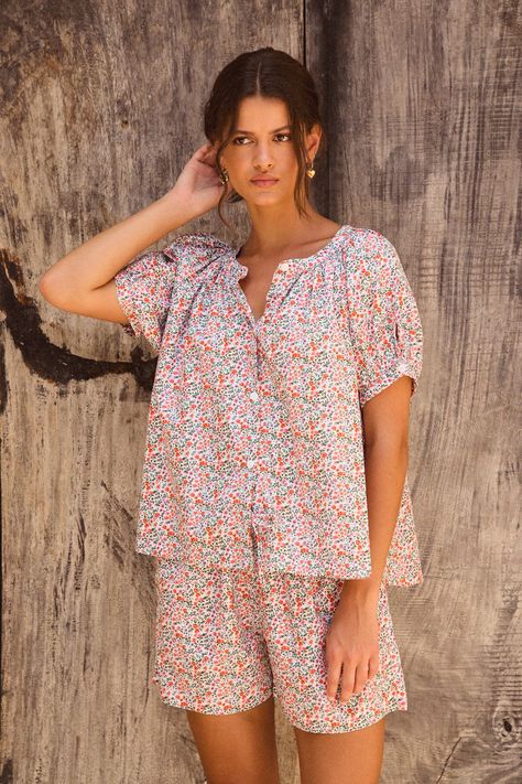 Description This versatile lounge set features a timeless ditsy floral printed on a buttery soft 100% cotton. Dress up or down for resort-style comfort.  Relaxed style fit Button down swing top makes it maternity friendly Shorts have pockets, comfortable elastic and drawstring 100% Cotton, pre-washed & softened Com