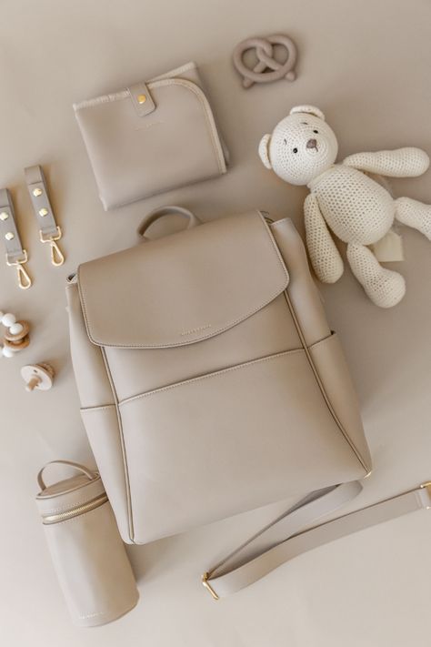 Diaper bag goals: stylish enough to be a purse and functional for all baby essentials. Who says you can't have it all? 💖  #MyMiaAndSophia  #Motherhood #Firstimemom #parentingjourney #diaperbag #mombag Elegant Shoulder Diaper Bag, Modern Shoulder Diaper Bag For On-the-go, Beige On-the-go Diaper Shoulder Bag, Versatile Beige Diaper Bag For On-the-go, Chic On-the-go Diaper Bag With Double Handle, Stylish Diaper Bag, Aesthetic Baby, Mom Bags, Baby Diaper Bags