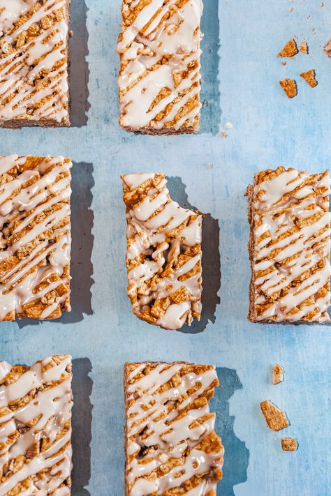 milk and cereal bars with milk icing drizzle lined up, center bar with bite taken out Milk And Cereal Bars Homemade, Milk Cereal Bars, Milk And Cereal Bars, Cereal Bar Recipe, Cinnamon Toast Crunch Bars, Cereal Bars Homemade, Milk And Cereal, Icing Drizzle, Cinnamon Toast Crunch Cereal