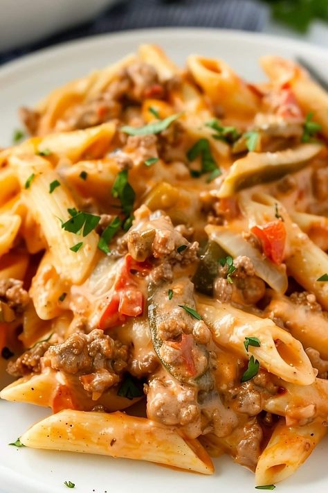 This Rotel pasta is creamy, dreamy, and full of delicious flavor! The combo of ground beef and Rotel tomatoes in a melty cream cheese sauce is divine. Tomato Based Dinner Recipes, 30 Min Pasta Meals, Rotel Sausage Pasta, Hot Pasta Dishes Easy Dinners, Sunday Beef Dinner Ideas, Creamy Pasta With Ground Beef, Rotel Taco Pasta, Recipes That Use Spaghetti Sauce, Creamy Hamburger Pasta