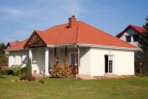 Houses with warm red roofs are popular for classic, rustic, farmhouse, country, Spanish, or modern aesthetics. But you're probably stumped on what col... | 10 Lily of the Valley Roof House Ideas, Red Roof House Colors, Shutter Paint Colors, Buying A New House, Red Roof House, Tan House, Shutter Colors, Green Shutters, Outside Paint