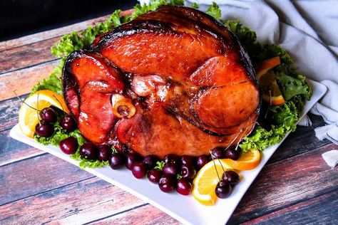 A glaze can take a baked ham from basic to amazing. This is a delicious glaze for a holiday ham. Check out all the flavors in this blue ribbon recipe. Honey Glaze For Ham, Cherry Glaze Recipe, Bourbon Ham Glaze, Cherry Glazed Ham, Bourbon Ham, Glaze For Ham, Cherry Bourbon, Holiday Ham Recipes, Cherry Glaze