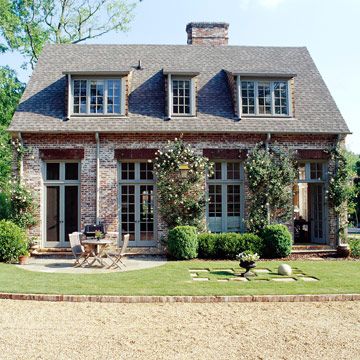 Create Patterns with Dormers  If lots of light is needed, triple shed dormers are a great solution. However, playing with widths and placing a skinny window between two wider windows adds a hint of the unexpected. Mixing sizes also prevents a crowded roofline. Home Designs Exterior, Shed Dormer, Lots Of Windows, Dormer Windows, Casas Coloniales, Garden Cottage, Brick House, Cottage Homes, Pool House