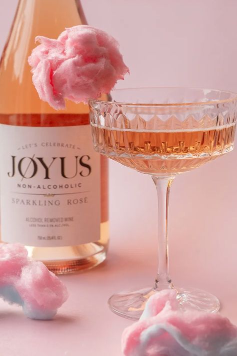 Look no further because we have the most delightful drink to sweeten those summer vibes. Introducing the Non-Alcoholic Cotton Candy Spritz. An oh-so-adorable non-alcoholic cocktail that will make you feel like you're sipping jøy straight from a unicorn's mane. Get ready to unleash your inner child with every sip. Rose Alcohol, Cotton Candy Drinks, Cotton Candy Cocktail, Summer Mocktail, Cloud Decor, Spritz Cocktail, Candy Cocktails, Non Alcoholic Wine, Cotton Candy Flavoring