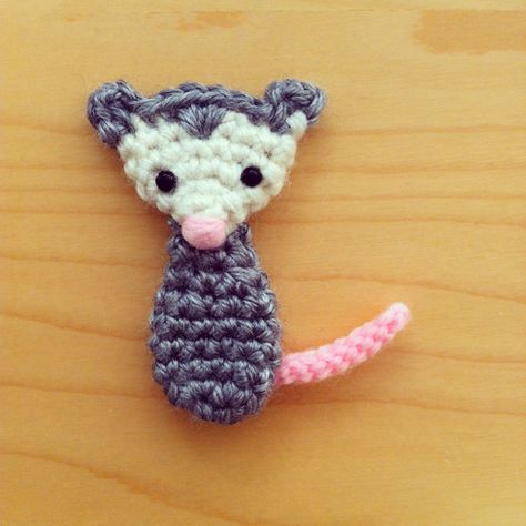 Do you say possum or opossum? “The ‘O’ is silent, I think,” suggests Mike. Or we can say, “possum, o-possum” all poetic-like. Which reminds me of the wonderful v… Crochet Flat Animals, Crochet Opposum Pattern Free, Opposum Crochet, Opossum Aesthetic, Small Crochet Projects Free Patterns, Possum Crochet, Crochet Possum, Opossum Crochet, Crochet Opossum