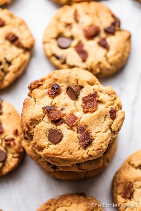 Bacon peanut butter cookies are THE BEST cookies ever. They're soft and chewy and packed with an incredible salty/smoky/sweet flavor from the bacon, bourbon, and peanut butter. It's the perfect combination and makes for one amazing cookie! #theendlessmeal #cookies #baconcookies #peanutbuttercookies #peanutbutterbaconcookies #bacon #peanutbutter #bestcookies #cookierecipe Whiskey Cookies, Bacon Chocolate Chip Cookies, Bacon Desserts, Peanut Butter Bacon, Bacon Cookies, Bourbon Bacon, Hazelnut Recipes, Best Cookies Ever, The Best Cookies