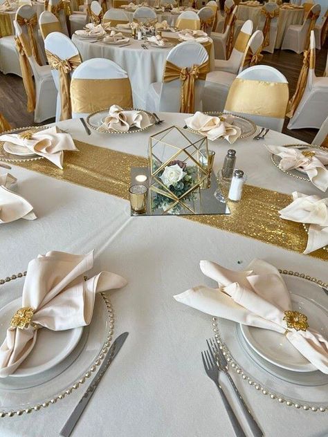 Gold Table Arrangements, White And Gold Quince Table, White And Gold Birthday Table Decor, White And Gold Engagement Party Centerpieces, Champagne And White Party Decor, Table And Chair Decorations For Party, Wedding Decorations Gold And White, Gold Table Settings Wedding, White And Gold Anniversary Party