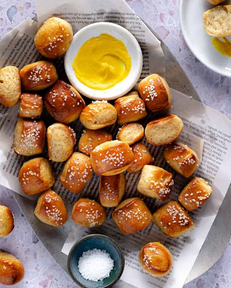 Soft, pillowy, and coated in melted butter, these Sourdough Discard Pretzel Bites are easy to make and ready in about an hour Discard Little Bites, Sourdough Soft Pretzel Bites, Sourdough Discard Pretzel Bites, Discard Pretzel Bites, Sourdough Pita Bread Recipe, Sourdough Discard Pretzels, Discard Pretzels, Sourdough Pretzel Bites, Sourdough Pretzel