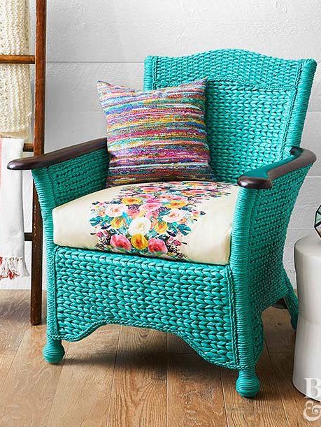 Help a chair with good bones but a less-than impressive color scheme find its groove again. Use the old cushion cover as a pattern to sew a new seat cover from eye-catching fabric—or simply wrap and staple a chic blanket around the seat cushion for a no-sew option. Then update the frame with a paint color that coordinates with the new fabric. Top off the patio furniture makeover with a statement pillow and you'll be glad you kept that old wicker chair in storage for so many years. Old Wicker Chairs, Vintage Furniture Makeover, Patio Furniture Makeover, Painted Wicker, Patio Furniture Cushions, Wicker Patio Furniture, Furniture Feet, Furniture Market, Wicker Chairs