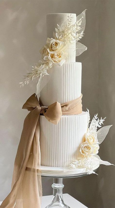 Bow Wedding Cakes, Wedding Cake Designs Elegant, Roses Wedding Cake, Tall Wedding Cakes, Cream Wedding Cakes, Extravagant Wedding Cakes, Ivory Wedding Cake, Wedding Cake Servings, Bow Cakes