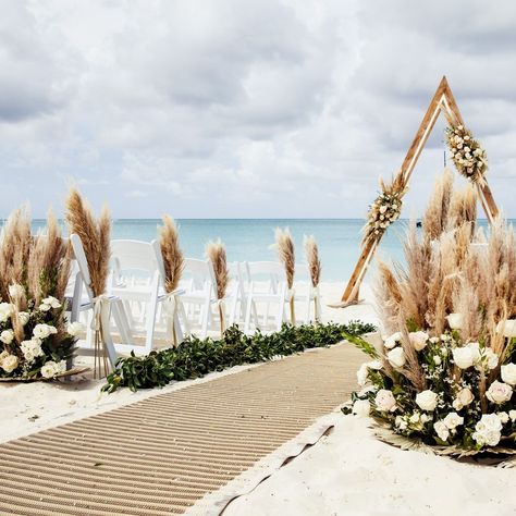 Flowers by EA | Boho beach vibes for Lori & Alexis' special day. 📷 by @attimiphotography . . . . . . . . . #bohowedding #beachwedding #pampasgrass… | Instagram Beach Wedding Arch Ideas Simple, Beach Wedding Arch Ideas, Beach Wedding Arbor, Beach Wedding Arbors, Beach Wedding Setup, Ocean View Wedding, Beach Wedding Arch, Bohemian Beach Wedding, Boho Beach Wedding