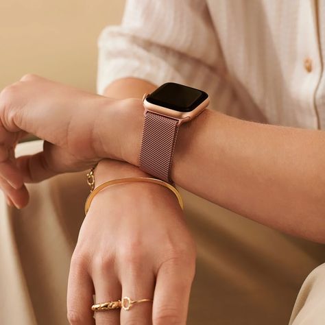 Milanese Loop Apple Watch Band Our Milanese Apple Watch band offers a touch of sophistication and class on your wrist. Inspired by designs created in Milan in the late 19th century, this Milanese mesh bracelet is a timeless work of art. Its metal buckle gently wraps around the wrist, offering a minimal and sophisticated look . Thanks to its magnetic closure system , you can adjust the strap precisely for personalized comfort. #aunomay #watchband #applewatch Apple Watch Stand, Rose Gold Apple Watch, Valentines Gift Guide, Gold Apple Watch, Resin Bracelet, Vintage Rose Gold, Gold Apple, Apple Watch Accessories, Rose Gold Watches