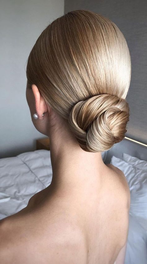 2. Sleek Low Bun We don’t know about you, but we’re kind of over updo hairstyles, especially hot warmer seasons are ahead of us. ... Sleek Bun Hairstyles, Sleek Low Bun, Low Bun Wedding Hair, Sanggul Modern, Wedding Bun Hairstyles, Wedding Hair Up, Low Bun Hairstyles, Sleek Updo, Guest Hair