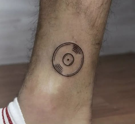 Simple Record Tattoo, Album Inspired Tattoos, Small Record Tattoo, Small Vinyl Record Tattoo, 70s Music Tattoo, Vinyl Record Tattoo Minimalist, 80s Inspired Tattoos, Vinyl Record Tattoo Ideas, Vynil Record Tattoo