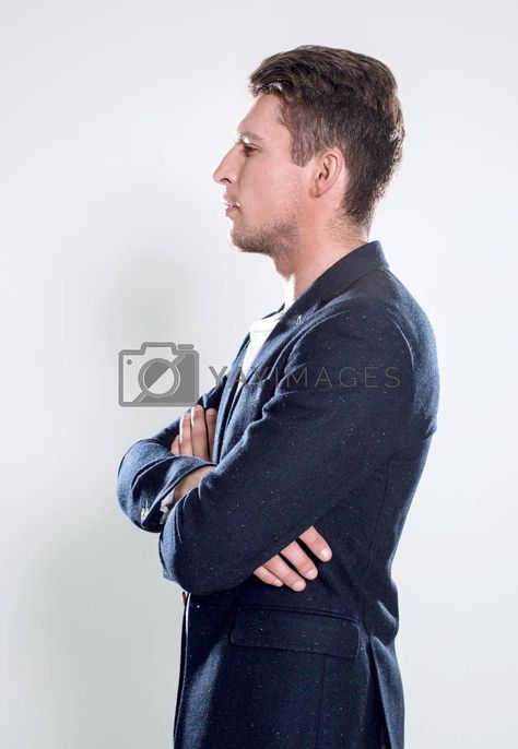 Portrait of a smart young man standing with arms crossed over gr #Ad , #standing, #arms, #crossed, #gr Arms Crossed Side View, Man Crossing Arms Reference, Cross Arms Reference, Arm Crossed Reference, Man Crossing Arms, Arms Crossed Reference, Crossing Arms Reference, Crossed Arms Reference, Arms Crossed Pose