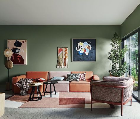 Shades of dusty greens are having a moment this season! Softer green hues have been very popular, and are a great option for people who naturally gravitate towards more neutral tones.   | 📸: Dulux Dusty Green Living Room