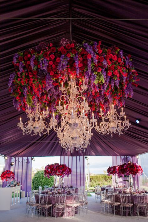 White Lilac Inc Hanging Red and Purple Floral Chandelier Red Purple Wedding, Floral Chandeliers, Ceiling Wedding, Wedding Chandeliers, Hanging Florals, Wedding Tent Decorations, Orchid Photography, Flowers Hanging, Grand Wedding