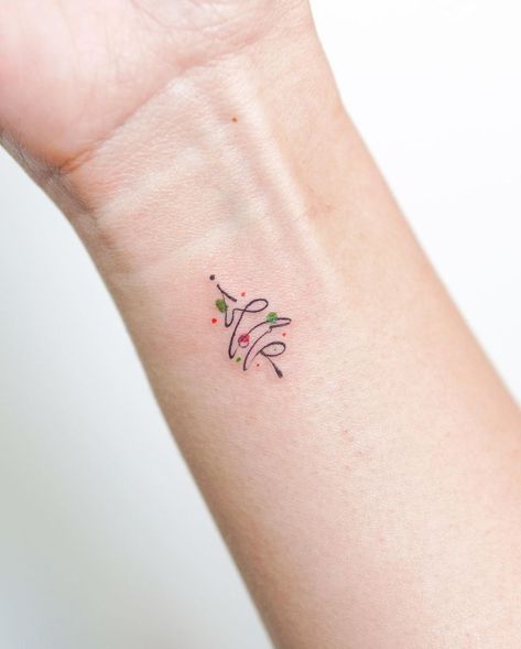 Christmas Tree Tattoo Small Simple, Christmas Fine Line Tattoo, Simple Christmas Tattoo Ideas, Small Christmas Tattoos For Women, Fine Line Christmas Tattoo, Tiny Christmas Tattoo, Subtle Christmas Tattoo, Christmas Theme Tattoo, Christmas Tree Tattoo Ideas