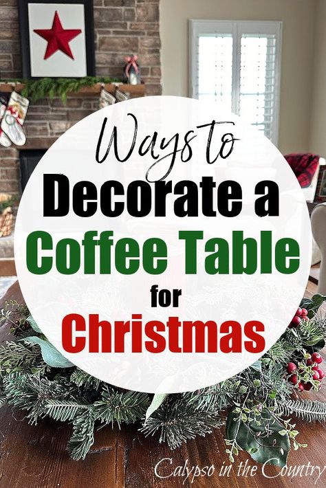 Coffee table with wreath in family room with stone fireplace. Christmas Decor For End Table, Christmas Decorations For Coffee Table, Coffee Table Xmas Decor Ideas, Christmas Decor Ideas For Table Top, Round Coffee Table Christmas Decor Ideas, Christmas Coffee Table Ideas, Side Table Christmas Decor Living Room, Christmas Decor Ideas For Coffee Table, Christmas Coffee Table Decorations