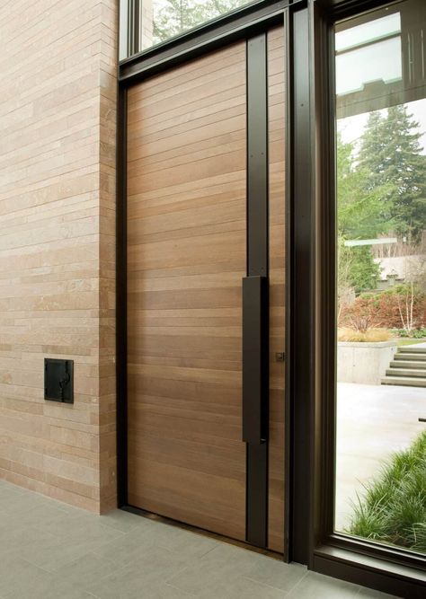 Inside a modern yet warm home on a bluff overlooking Lake Washington Tor Design, House Main Door, Modern Entrance Door, Modern Exterior Doors, House Main Door Design, Main Entrance Door Design, Steel Door Design, Main Entrance Door, Modern Entrance