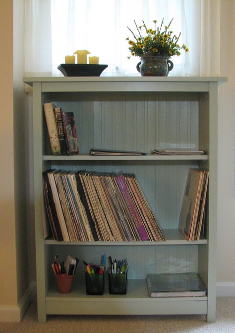 DIY sage green bookcase with beadboard backing. Plain Bookshelf Makeover, Sage Green Shelves, Sage Green Bookshelves, Bookcase Next To Bed, Sage Green Shelf, Small Vintage Bookshelf, Olive Green Bookshelf, Sage Green Bookcase, Light Green Bookshelf