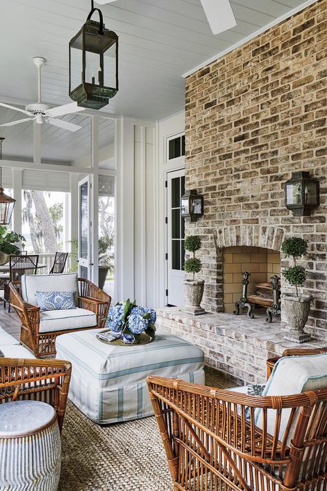 enclosed porch with brick fireplace and lantern lighting Southern Living Idea House, Southern Living Magazine, Porch Fireplace, Southern Living Homes, Southern Homes, Outdoor Living Room, Amelia Island, Porch Design, Kitchen Decorating