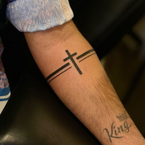 50  Best Cross Tattoo Ideas for Men of Faith Man Wrist Tattoo, Cross Tattoos With Words, Bible Verse Tattoos For Men Forearm, Faith Tattoo Men, Mini Tattoos Men, Cross Tattoos For Men Forearm, Cross Tattoo Forearm, Cross Tattoo Men, Cross Tattoo Ideas For Men