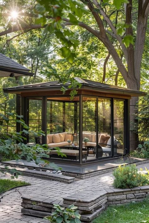 modern gazebo with glass walls Backyard Glass House, Outdoor Rooms Patio, Glass House Garden, Modern Gazebo, Screened Gazebo, Outdoor Gathering Space, Ultimate Backyard, Glass Pavilion, Beautiful Outdoor Living Spaces