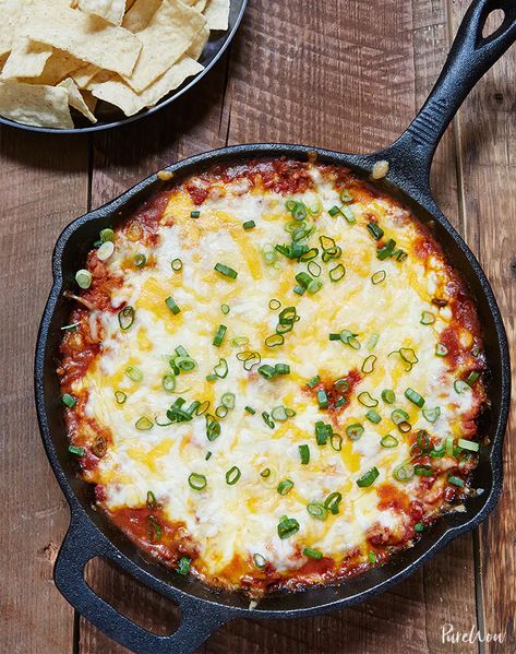 Skillet Nacho Dip: The Ultimate Appetizer - PureWow Nachos Dip Recipe, Skillet Nachos, Nacho Dip, Iron Skillet Recipes, Cast Iron Skillet Recipes, Superbowl Snacks, Nachos Recipe, Skillet Meals, Snacks Für Party