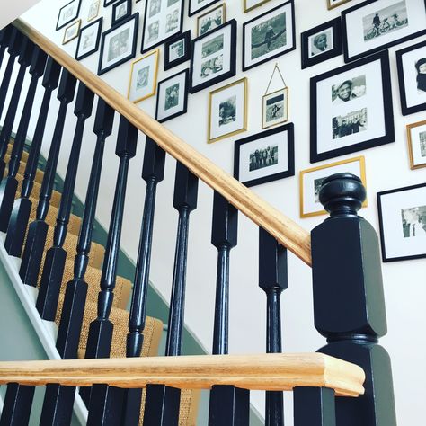 Dark Green Stair Banister, Black And Wood Bannister, Black Wood Banister, Black And Wood Banister, Natural Wood Banister, Black And Gold Staircase, Stair Banister Paint Ideas, Staircase Black Spindles, Wall Next To Stairs