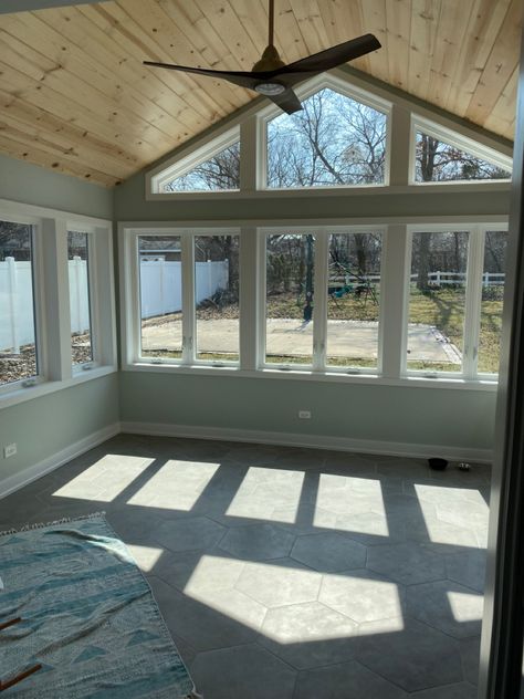 Windows In Sunroom, Small Family Room Addition, Sunroom Flooring Ideas Farmhouse, Sunroom Paneling, Vaulted Sunroom, Windows For Sunroom, Windows Sunroom, 3 Season Room Tile Floor, Four Season Room With Fireplace