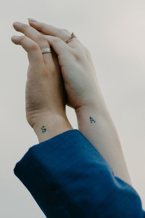 Small Tattoos Husband And Wife, Couple Tattoos 2023, Small Tattoos For Wife, Tiny Marriage Tattoos, Subtle Marriage Tattoo, Fine Line Husband And Wife Tattoos, A Tattoo Letter Initial On Finger, Dainty Couple Tattoos Simple, Husband And Wife Initial Tattoos