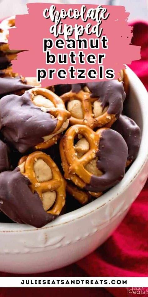 Chocolate Dipped Peanut Butter Pretzels are a quick and easy holiday treat. Peanut butter frosting in between two pretzels that are dipped in chocolate. The perfect sweet and salty combo. Once you start munching on these you won't be able to stop! Peanut Butter Pretzels, Peanut Butter Dip, Butter Pretzels, Chocolate Dipped Pretzels, Peanut Butter Pretzel, Dipped In Chocolate, Snack Mix Recipes, Peanut Butter Frosting, Candy Recipes Homemade