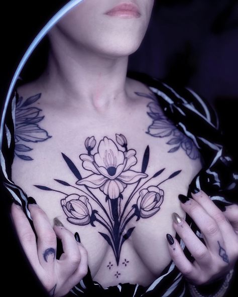 Flower tattoo design chest piece black and gray woman tattoo Flower Bouquet Tattoo Chest, Blackwork Chest Tattoo Woman, Iris Chest Tattoo, Chest Piece Cover Up Tattoo, Flower On Chest Tattoo, Neotraditional Flower Tattoo Black, Orchid Chest Tattoo, Asymmetrical Chest Tattoo, Art Nouveau Chest Tattoo