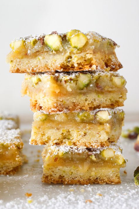 These delightful and easy lemon bars have everything the traditional ones do – tang, sweetness and a buttery base – plus the added benefit of pistachios folded into the filling and the crust. Easy Lemon Bars, Lemon Bars Easy, حلويات عربية, Lemon Bars Recipe, Nyt Cooking, Lemon Bars, Lemon Desserts, Desserts Recipes, Lemon Recipes