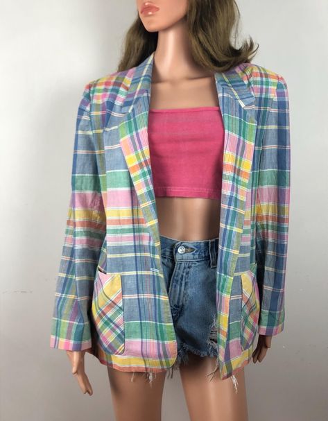 Vintage pastel plaid oversized blazer from the late 70s / early 80s.  Features a notch collar with a single button closure at the waist.  Has a longer length silhouette with two front hip patch pockets and long straight sleeves.  It has shoulder pads which could be easily removed if you so desired.  Made of a lightweight woven madras cotton material with pastel plaid designs in shades of pink, purple, blue, green, yellow, orange and white.  Freshly laundered and ready to wear. Label: "Country Suburbans".  Made in U.S.A of imported fabrics.  Also has an ILGWU tag.   Fiber Content: No label present, but seems to be a woven cotton madras. Stamped Size: 18.  Seems smaller than that and looks great as an oversized look.  Please see the measurements listed at the end of the description to ensure 80s Pastel, Pastel Plaid, Pink Purple Blue, Summer Jacket, Notch Collar, Womens Blazers, Oversized Blazer, Plaid Design, Oversized Look