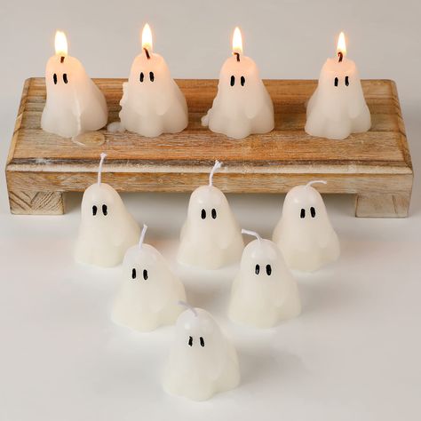 PRICES MAY VARY. Satisfy Your Use Demands: you will get 10 pieces of halloween candles in the package in total, and they are all in the same shape, which can provide you with enough quantity and rich choices for your daily decor and holiday use Ideal Festive Decor: these halloween home decors adopt the shape of ghost, and each piece has 2 big eyes, which look interesting and cute, very in line with the theme of the festival, enhance an intense Halloween atmosphere in your home Compact Size: each Halloween Candle Decor, Candles For Halloween, Porche Halloween, Candles Burning, Specialty Candles, Casa Halloween, Cute Halloween Decorations, Ghost Candles, Spooky Candles