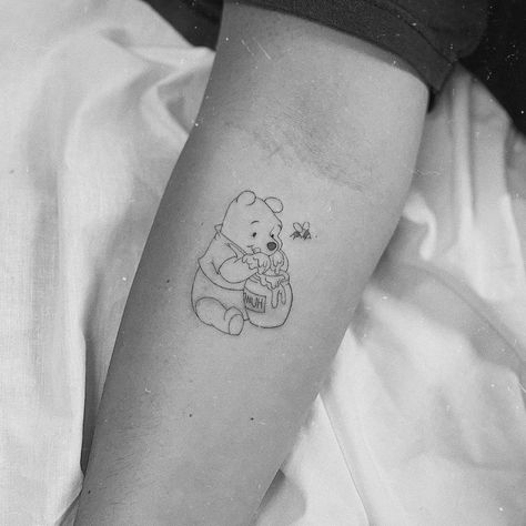 Winnie The Pooh And Butterfly Tattoo, Tao Of Pooh Tattoo, Winnie The Pooh Wrist Tattoo, Fine Line Pooh Bear Tattoo, Cute Cartoon Tattoo Ideas, Wine The Pooh Tattoo, Winnie The Pooh Tattoo Small, Winny The Pooh Tattoos, Cute Winnie The Pooh Tattoos