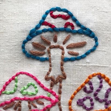 Sarah 🪡🧵 Thread The Word on Instagram: "More magic 🍄🍄🍄 . . . #magicmushrooms #embroidery #embroideryart #magicwoods #psychedelic #colour #toadstool #foraging #ukforaging #mushrooms #wildmushrooms #threadtheword" Easy Mushroom Embroidery, Mushroom Embroidery Tutorial, Mushroom Embroidery Simple, Mushroom Embroidery Pattern Simple, Mushroom Embroidery Pattern, Embroidery Mushrooms, Embroidery Toadstool, Embroidery Words, Trippy Mushroom Embroidery