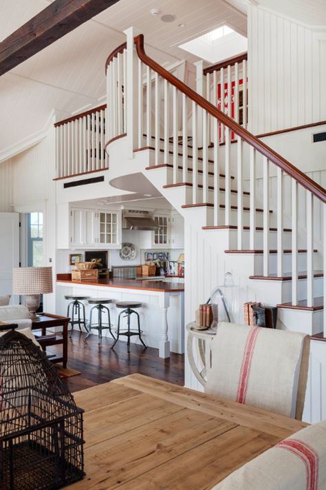 https://onekindesign.com/2014/03/21/55-amazing-space-saving-kitchens-under-the-stairs/ Kitchen Under Stairs, Patrick Ahearn Architect, Patrick Ahearn, Beach Style Kitchen, Stairs In Kitchen, Car Barn, Space Saving Kitchen, Coastal Living Rooms, Under Stairs