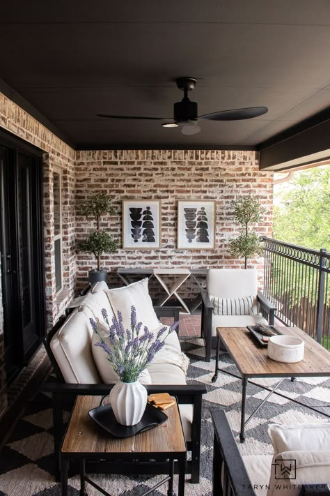 Modern French Country outdoor decor. Tour this space and get the sources for this look. Moody ceiling and dark trim against the brick walls create a modern contrast to a traditional exterior. Dreamy Classroom, French Country Porch, Country Porch Decor, Country Patio, Brick Wall Decor, Balcony Makeover, French Country House Plans, Modern French Country, Country Porch