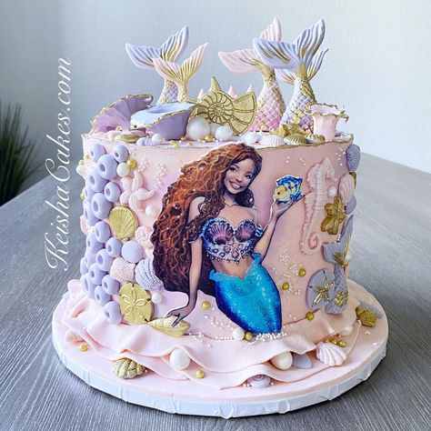 Halle Bailey Little Mermaid themed birthday cake. With edible image of Halle Bailey as The Little Mermaid and handmade fondant shells, pearls, mermaid tails and sea horses. Lil Mermaid Cake, Black Mermaid Cake, Black Little Mermaid Cake, Black Little Mermaid Birthday Party, Little Mermaid Birthday Party Cake, Little Mermaid Cake Ideas, The Little Mermaid Birthday Cake, Mermaid Cake Birthday, Barbie Mermaid Cake