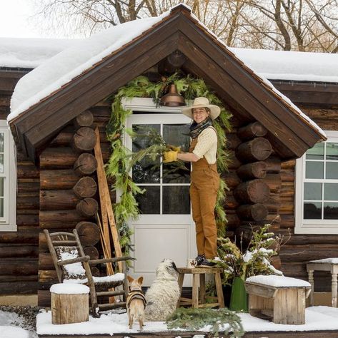 Wilson Wyoming Log Cabin Christmas Exterior Cozy Log Cabin Exterior, Cottage Christmas Decor Exterior, Christmas At The Cabin, Lodge Home Exterior, Christmas Cottage Exterior, Log Cabins Exterior, Log Cabin Porch, Painted Log Cabin, Wilson Wyoming