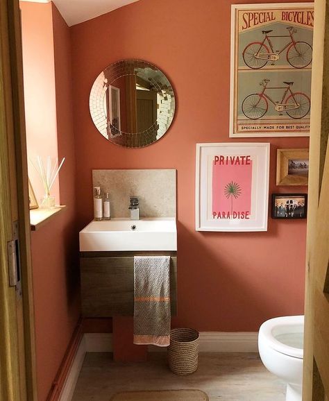 Lick on Instagram: “'Our cold & plain downstairs toilet transformed into a terracotta dream, so cosy & warm it almost transports you somewhere sunny when…” Bathroom Terracotta Walls, Terracotta Bathroom Walls Paint Colors, Terracotta Colour Bathroom, Terracotta Wall Color Bathroom, Salmon Bathroom Walls, Terracotta Toilet Room, Terracotta Walls Bathroom, Boho Terracotta Bathroom, Sage Green And Terracotta Bathroom